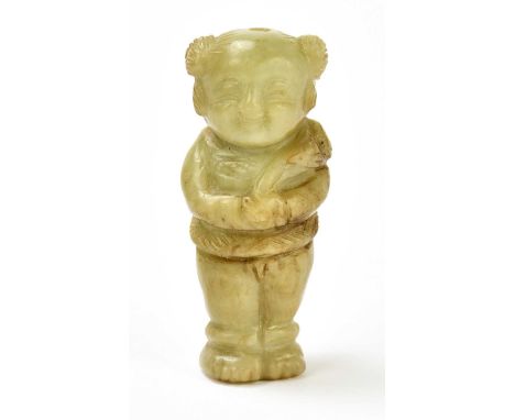 A Chinese carved jade figure of a child, with russet inclusions throughout, and drill hole vertically through the figure, len