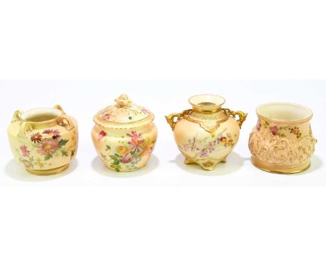 ROYAL WORCESTER; four pieces of blush ivory including a cylindrical jar and cover with pineapple finial, a four handled vase,