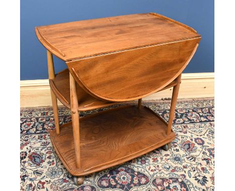 ERCOL; a light elm drop-leaf three tier dinner wagon/drinks trolley, height 75cm, width 74cm.
