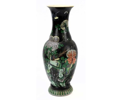A Chinese Famille Noire baluster vase decorated with bird, butterflies, and floral sprays, spurious character marks to base, 
