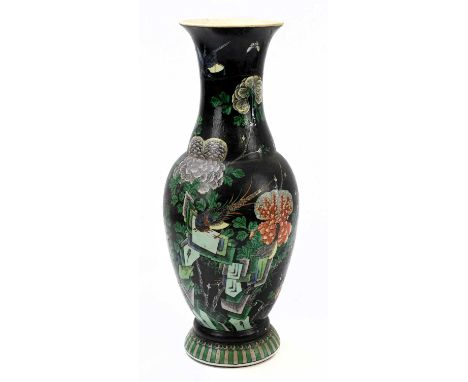 A Chinese Famille Noire baluster vase decorated with bird, butterflies, and floral sprays, spurious character marks to base, 