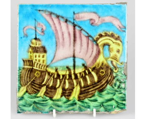 WILLIAM DE MORGAN; an Art Pottery tile painted with a ship at sail with three sailors rowing, in shades of lilac, blue, yello