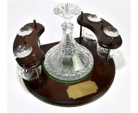 LIVERPOOL FOOTBALL CLUB; a wooden and brass mounted cut glass ship's decanter with four brandy balloons, with engraved plaque