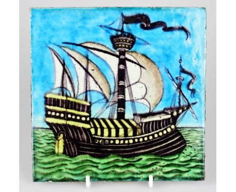 WILLIAM DE MORGAN; an Art Pottery tile painted with a four masted galleon ship in shades of blue, white, green and black, 15.