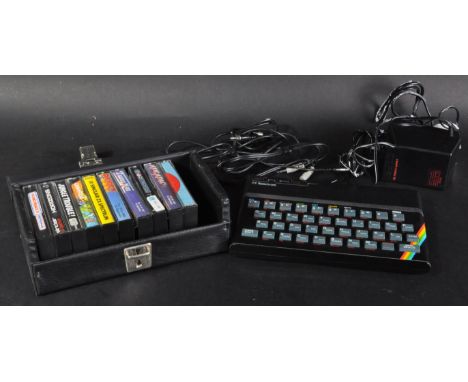 A original vintage 1980's Sinclair made ZX Spectrum personal computer / video game console with gaming cassette tapes. Games 