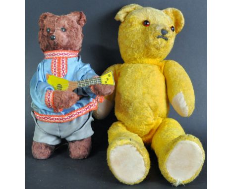 A vintage English soft toy teddy bear (likely Chad Valley / Chiltern) with short pile plush hair, flat bottom paws and stitch