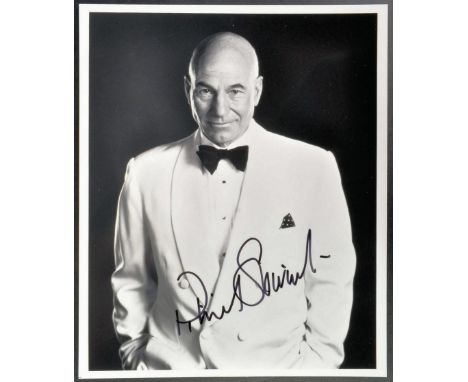 Star Trek - Sir Patrick Stewart - an autographed 8x10" black and white photograph of Stewart who played Captain Picard in the