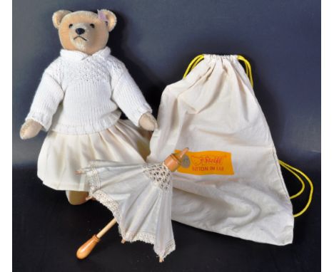An original vintage Limited Edition German Steiff made soft toy teddy bear 660771 ' Nora '. The bear having short blonde moha