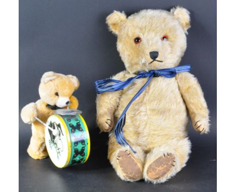 A British Chiltern made soft toy teddy bear and a smaller ( likely British ) clockwork teddy bear. The Chiltern bear having p