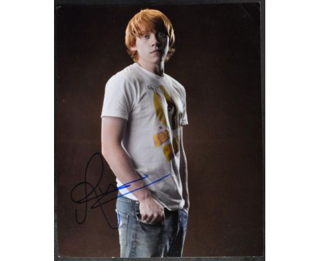 Rupert Grint - Harry Potter - autographed 8x10" colour photograph of Grint, signed in blue ink to a lighter central area of t