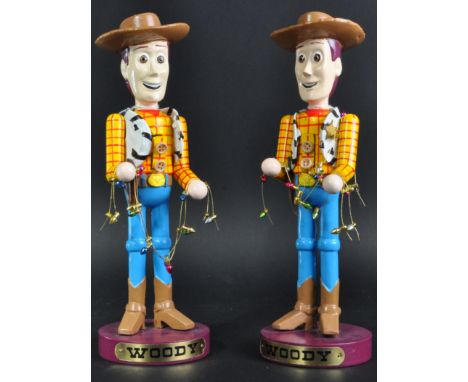 Two vintage Disney Pixar licenced Toy Story's Woody nutcrackers. Hand painted resin construction with a&nbsp;nutcracker lever