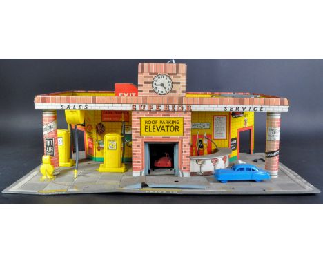 An original vintage Mettoy pressed tin plate model No. 6270 Superior Service Filling Station. The model with integrated bar a