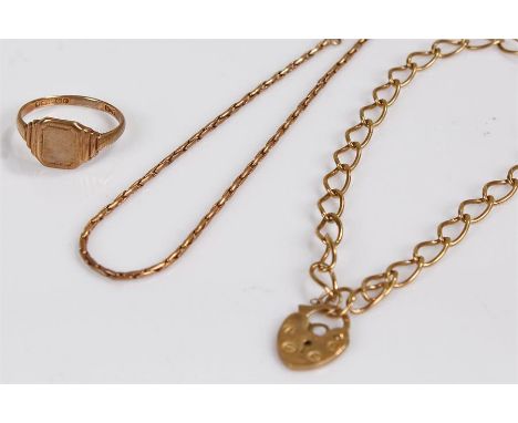 9 carat gold jewellery, to include a chain, another with padlock and a ring, 6.5 grams, (3)