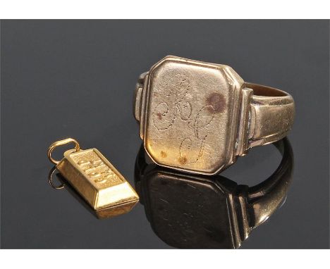 14 carat gold charm, 0.5 grams together with a yellow metal ring, 7 grams, (2)