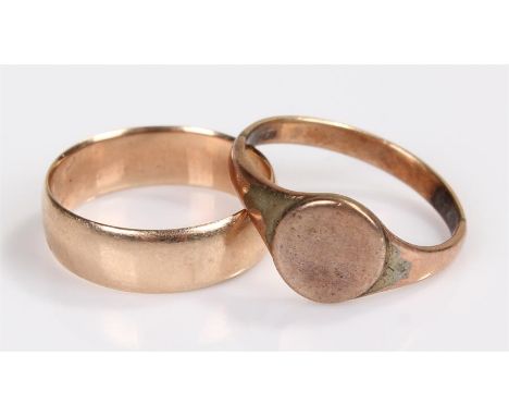 9 carat gold signet ring, together with a yellow metal band, total weight 5.3 grams, (2)