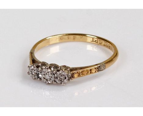 18 carat gold and diamond ring, set with three diamonds, 1.9 grams