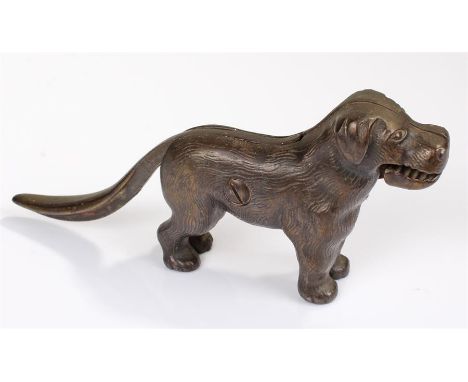 Novelty metal nut cracker in the shape of a dog