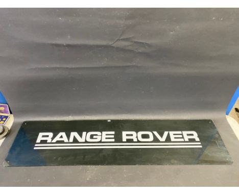 A Range Rover perspex showroom hanging sign, 48 x 12". 