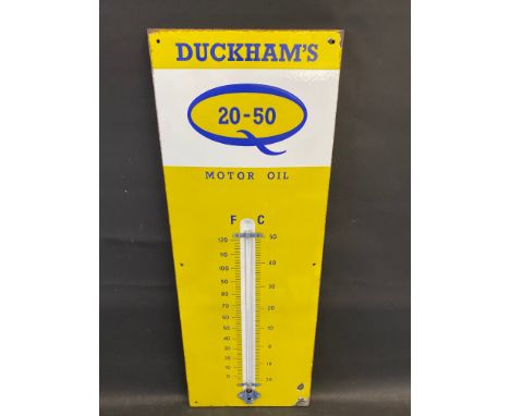 A Duckham's 20-50 Motor Oil enamel thermometer in very good condition, complete with working tube, 13 x 36". 