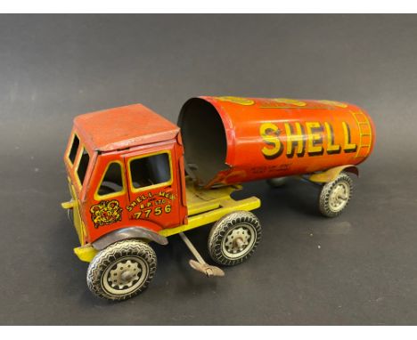 A British clockwork tinplate articulated fuel tanker with Shell-Mex &amp; BP Ltd advertising. 