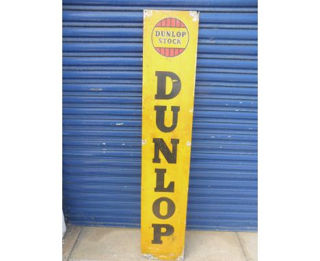 A Dunlop Stock aluminium advertising sign, 11 1/4 x 59 1/4". 