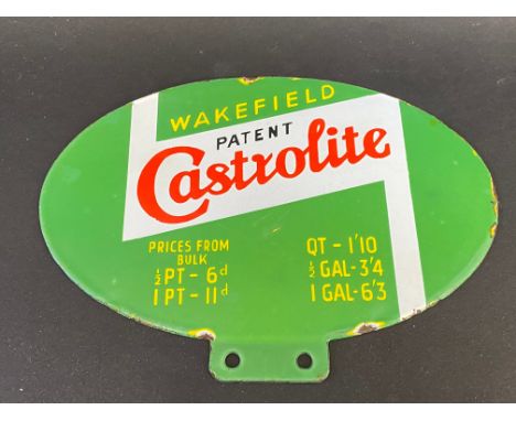 A rare Wakefield Patent Castrolite double sided enamel oval price tag, in good condition, 8 x 5 3/4".