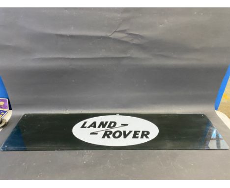 A Land-Rover perspex showroom hanging sign, 48 x 12". 