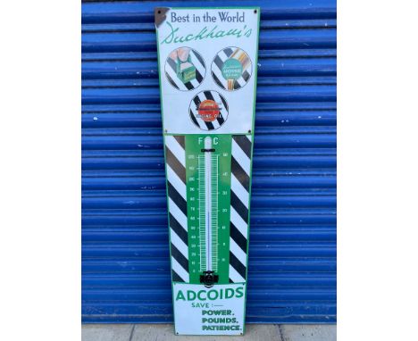 A Duckham's Adcoids enamel advertising thermometer garage sign in very good condition, complete with working tube, 11 x 46". 