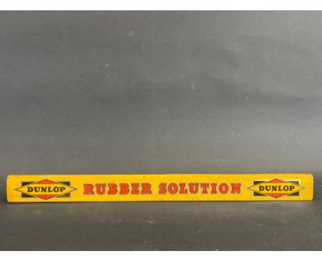 A Dunlop Rubber Solution shelf strip, in good condition. 