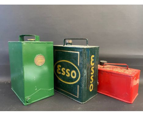 An unusual two gallon can bearing brass plaque for 'The Protector Lamp &amp; Lighting Co. Ltd.' plus two other fuel cans. 