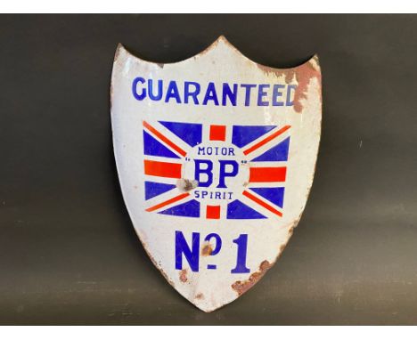 A BP Motor Spirit 'Guaranteed No. 1' shield shaped curved enamel sign with central union jack, 9 x 12". 