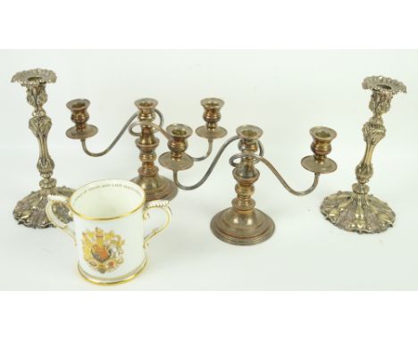Pair of silver plated candle sticks, a pair of three light candelabras, and a royal Worcester loving cup 