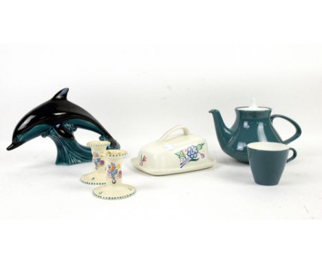 Large collection of Poole pottery including floral decorated candlesticks, similar platters, posy rings, two tone dinner ware