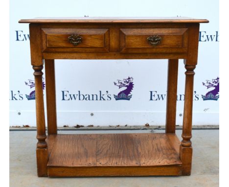 Modern oak console table with two frieze drawers.