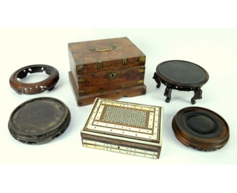 Oriental carved stands, eastern and African wood and metalware (one shelf)