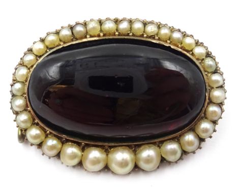 Early Victorian gold cabochon garnet and graduating split pearl set mourning brooch, 3cm