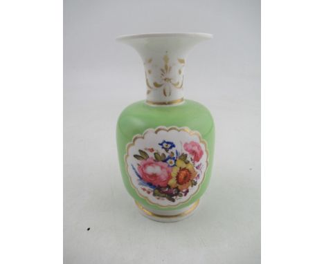 A Chamberlains Worcester vase, decorated with a reserved panel of flowers to an apple green ground, height 6ins&nbsp;