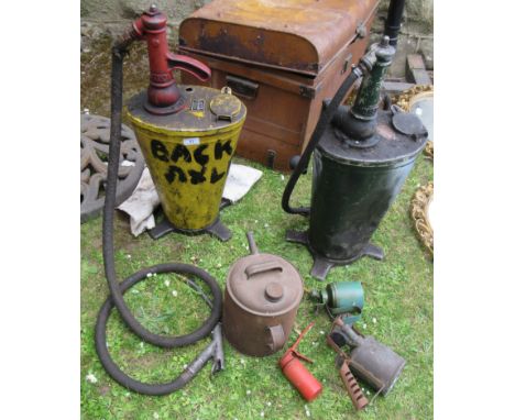 Two vintage oil pumps and oil cans&nbsp;