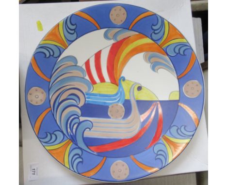 A Poole Studio large charger, decorated with a Viking Ship by Sue Pottinger, diameter 16ins, in carboard boxCondition Report:
