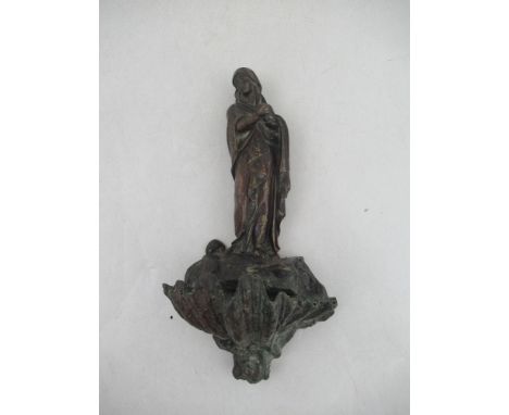 A 19th century continental cold painted bronze holy water stoup modelled as the the Madonna with clam shell water holder&nbsp