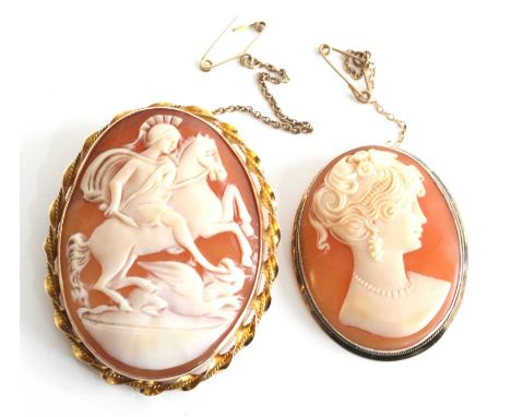 Two oval shell cameo brooches, one being 9ct yellow gold depicting Diana goddess of hunting slaying a dragon, with ropetwist 