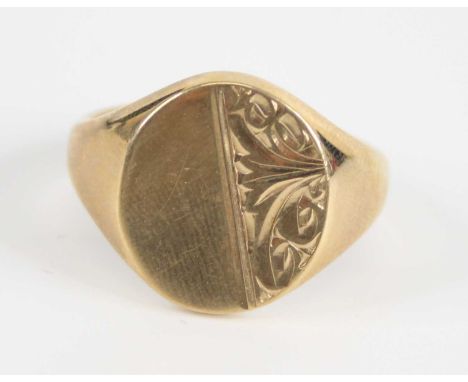 A gent's 9ct gold signet ring, having half engraved bezel, 8.5g, Birmingham 1975, sponsor EJ Ltd, size Q½