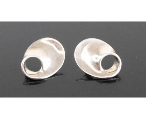 A pair of silver ear studs designed by Vivianna Toran for Georg Jensen, both stamped and numbered 142, 4.2g, 18mm