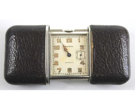 An Art Deco Movado Ermento steel and black leather cased travelling purse watch, having a signed square dial with subsidiary 