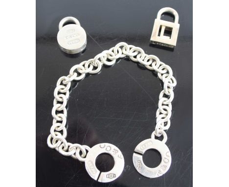 A Tiffany &amp; Co silver bracelet, 19.5cm; together with two Tiffany &amp; Co silver padlock clasps, gross weight 37.3g, wit
