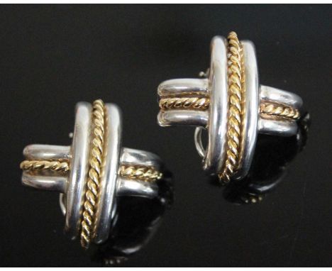 A pair of yellow and white metal Tiffany &amp; Co cross shaped clip earrings, having ropetwist detail and Omega clip and post