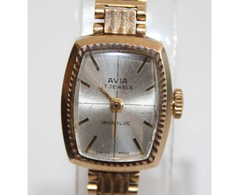 A lady's Avia 9ct gold cased bracelet watch, having incabloc manual wind 17-jewel movement, to an integral square link bracel