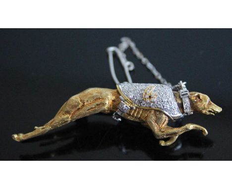 A yellow and white metal greyhound brooch, having pavé set diamond jacket and removable collar, with roller catch fastening a