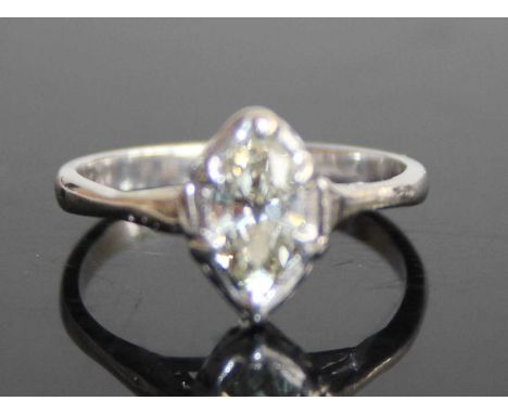 A platinum and diamond single stone ring, the bezel set marquise cut tinted diamond measuring approx 7.5 x 4.9 x 3mm, 2.6g, s