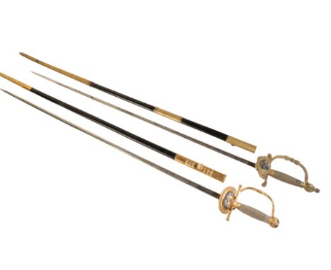 one by W. Purvey &amp; Son of Edinburgh, with gilt and wire metal grip and hilt, in original gilt metal and leather scabbard,